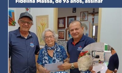 Diretores do Sindpol levam termo de adesão do acordo para aposentada Fidelina Massa, de 93 anos, assinar